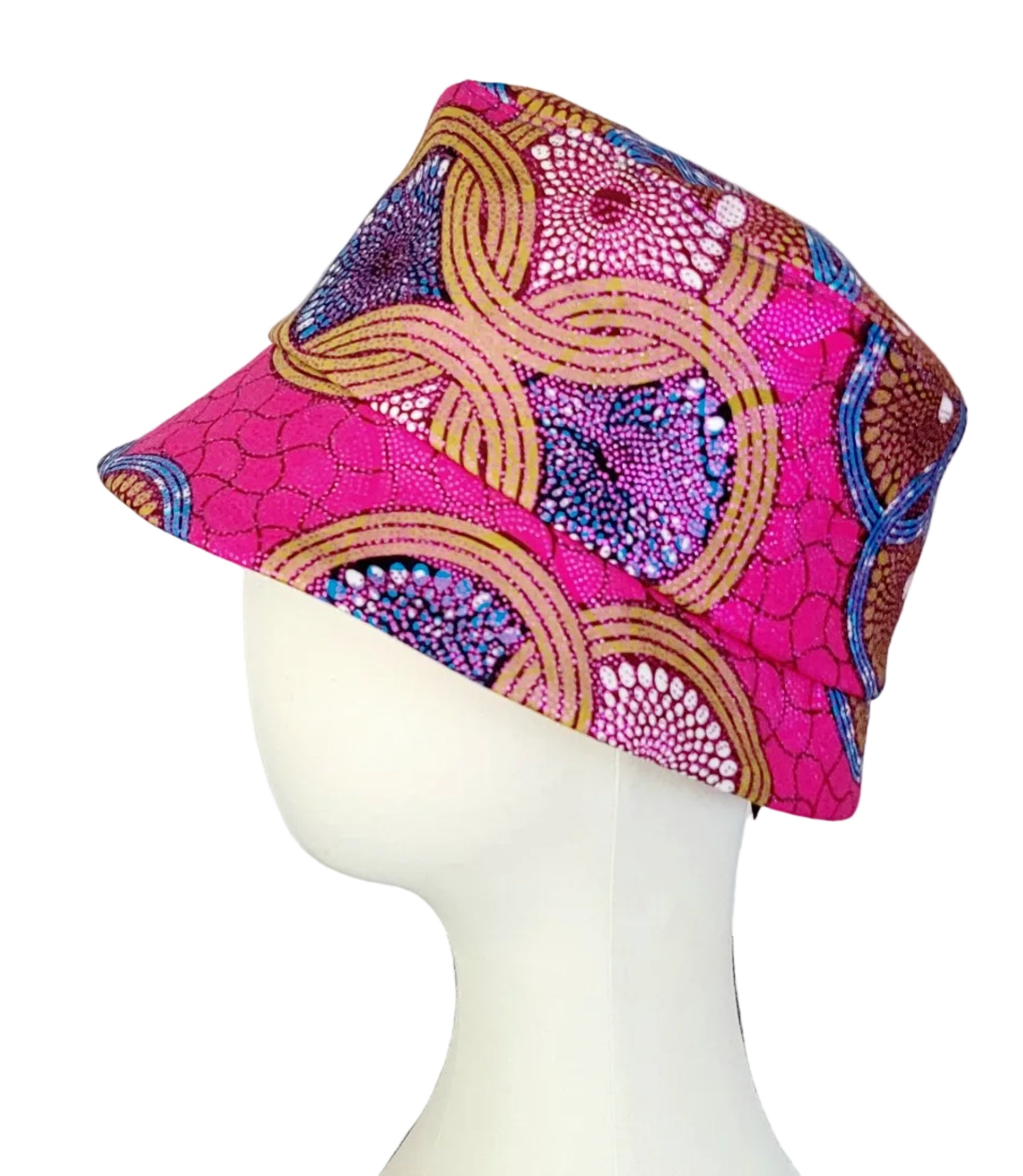 A bucket-style hat with a vibrant pink, purple, and gold patterned fabric.